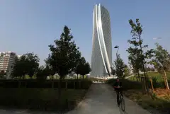 The Generali Tower at the CityLife district designed by Zaha Hadid; CityLife is a mixed-use luxury district on the north-east outskirts of Milan featuring swanky buildings by starchitects Daniel Libeskind, Hadid and Arata Isozaki.