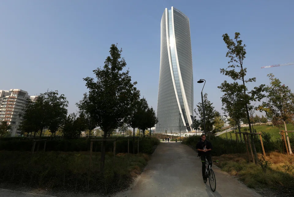 The Generali Tower at the CityLife district designed by Zaha Hadid; CityLife is a mixed-use luxury district on the north-east outskirts of Milan featuring swanky buildings by starchitects Daniel Libeskind, Hadid and Arata Isozaki.