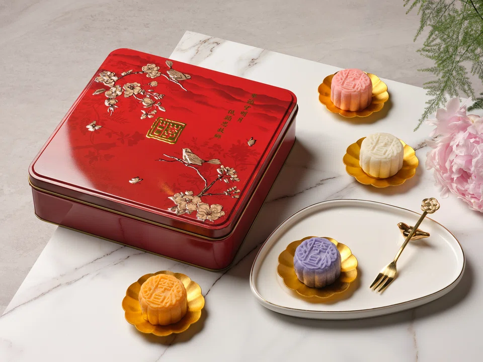 The beautifully designed red tin box can be a pretty keepsake.