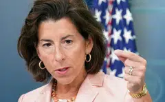 Gina Raimondo has said US firms face new challenges, among them unexplained large fines, raids on businesses and changes to a counterespionage law.
