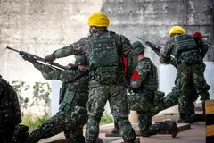 Taiwanese troops at a training exercise inside a military base in Taoyuan, Taiwan. The deployment of between 100 and 200 American troops to the island is to take place in the coming months.