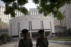 China’s central bank held a key policy rate in March while Chinese lenders maintained their benchmark loan rates. 