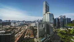 Guoco Tower's high-performance glass facade reduces heat gain while letting in a large amount of daylight.