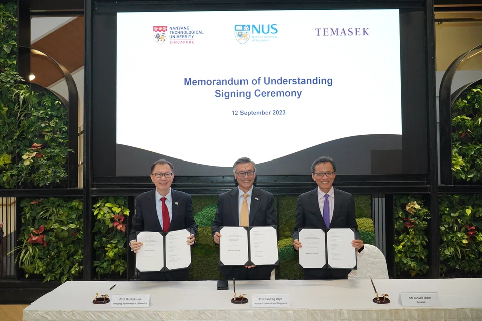 From left: NTU president Ho Teck Hua, NUS president Tan Eng Chye, and Temasek head of emerging technologies Russell Tham at the MOU signing ceremony. Temasek, NUS and NTU will provide startups with access to their networks of businesses and mentors.