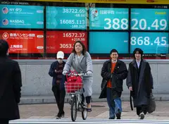 Tokyo stocks fell again at mid day on Tuesday as speculation swirls that the Bank of Japan will next week shift away from its ultra-loose monetary policy that has helped strengthen the yen.