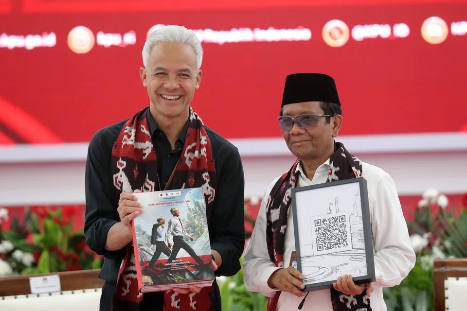 Ganjar (L) the ruling party’s candidate, began his campaign in the easternmost South Papua province, with running-mate Mahfud MD starting at the westernmost province of Aceh.