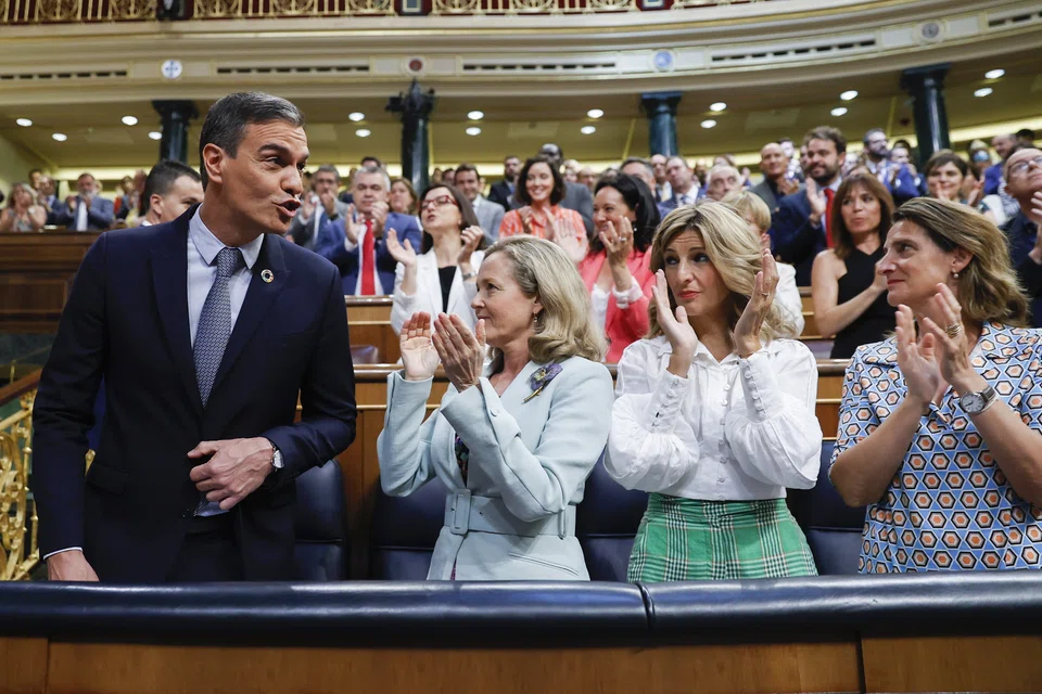  (L-R) Spanish Prime Minister Pedro Sanchez, Economy Minister Nadia Calvino, Labour Minister Yolanda Diaz, and Environment Minister Teresa Ribera attend the State of the Nation address at the Lower Chamber of Spanish Parliament in Madrid, Spain, 12 July 2022.  