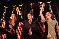 Democrat Tom Suozzi celebrates with his family after his victory in the special election to replace Republican Representative George Santos in Woodbury, New York, Feb 13, 2024. 