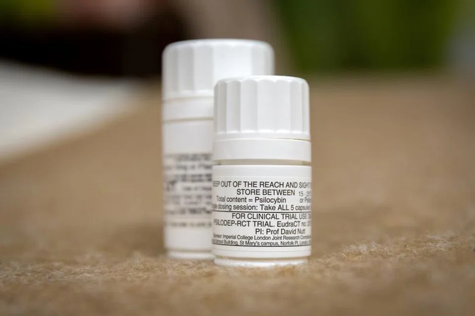 Psilocybin bottles (top). Psychiatrists in Australia will be able to prescribe MDMA and psilocybin – more commonly known as ecstasy and magic mushrooms from July after finding “sufficient evidence for potential benefits in certain patients”.