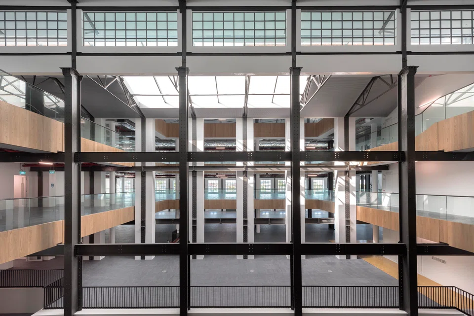 Inside St James Power Station, a new central atrium was also created to allow natural light to flow in.
