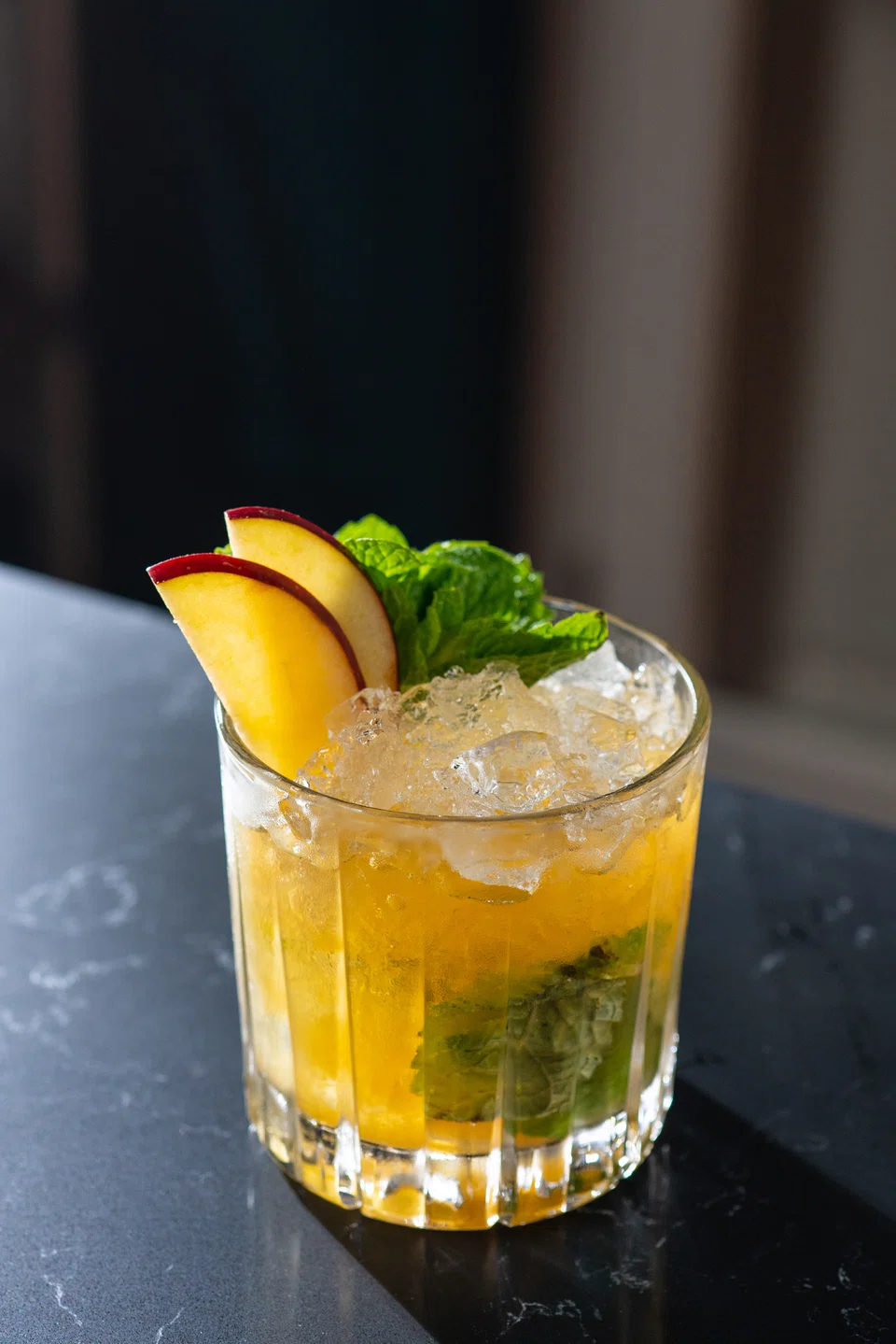 Named after a famous racehorse, the Secretariat cocktail at Farrer Horse draws inspiration from the equine diet with a hay bourbon base and apple puree.