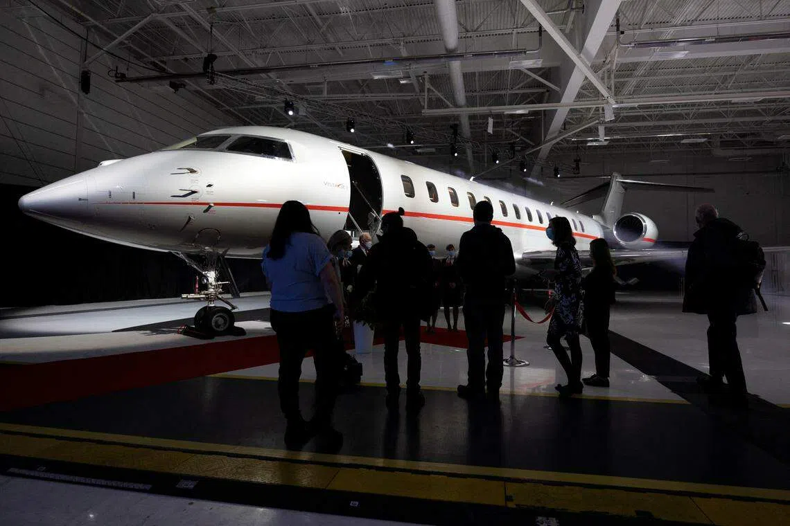 Bombardier reported a lower fourth-quarter adjusted net income of US$135 million, compared with US$205 million a year earlier, amid lingering supply snags that have raised costs for companies.