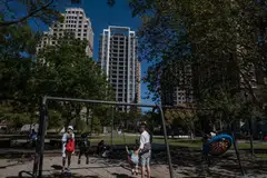 Residents at a park in front of residential buildings in the Guanxin district of Hsinchu, Taiwan. Home prices in Hsinchu have soared 99 per cent in the past five years, almost tripling the pace of Taiwan’s average.