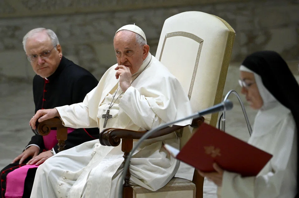 Pope Francis (in white) during the weekly general audience at the Vatican on Wednesday (Aug 30). His latest writing, to be issued on Oct 4, will update his influential 2015 document, also on climate change. 