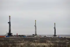 Brent and US crude prices notch their first weekly gains in a month, with the both benchmarks rising about 2 per cent.