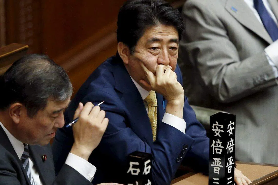 Unpopular Japan security bills approved by lower house
