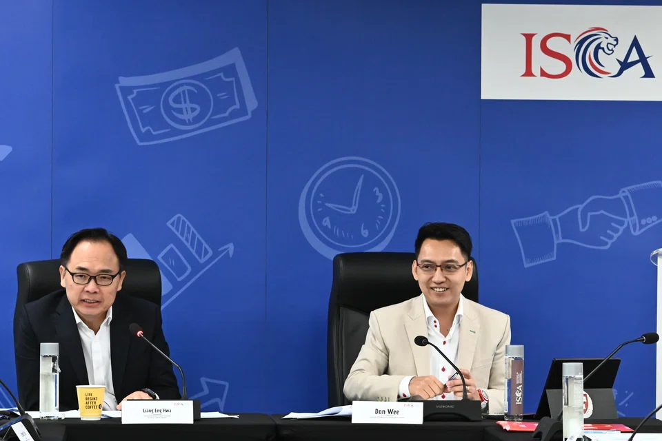 Members of Parliament Liang Eng Hwa (left) and Don Wee co-chaired the panel discussion, which included discussion of how the government can encourage SMEs in their sustainability journeys.
