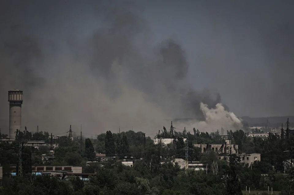 Smoke and dirt rise in the city of Severodonetsk during fighting between Ukrainian and Russian troops on June 2, 2022. A senior Ukrainian official said on Sunday that his country’s forces now control “half of the city".