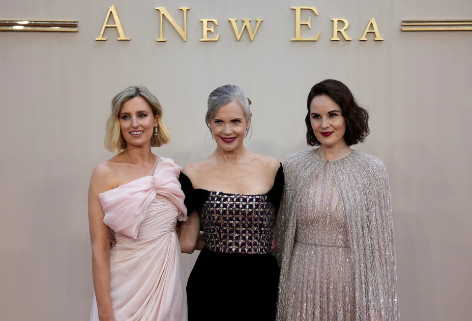 FILE PHOTO: Cast members Laura Carmichael, Elizabeth McGovern and Michelle Dockery arriving for the world premiere of 'Downton Abbey: A New Era' in London, Britain, last month.  