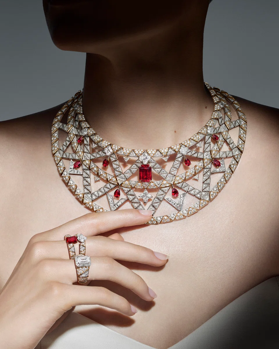 Destiny necklace in platinum and yellow gold with rubies and diamonds; ring in white gold with diamonds; ring in platinum and yellow gold with ruby and diamonds.



