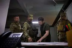 Ukraine's President Volodymyr Zelenskiy visits Ukrainian service members, as Russia's attack on Ukraine continues, in Soledar, Donetsk region, Ukraine, June 5, 2022. 