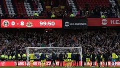 Newcastle players celebrating in front of their fans at Brammal Lane after their historic 8-0 win over Sheffield United on Sep 24. 