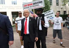 Peter Navarro, an advisor to former US President Donald Trump, leaves after being found guilty of contempt of Congress at the E. Barrett Prettyman Courthouse in Washington, DC, Sept 7, 2023 