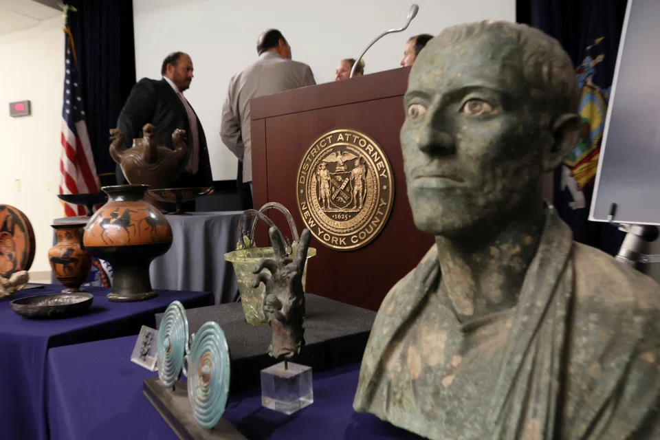 The returned items included a drinking cup called “White-Ground Kylix”, “Bronze Bust of a Man” (above), and vases, platters and other kitchenware.      