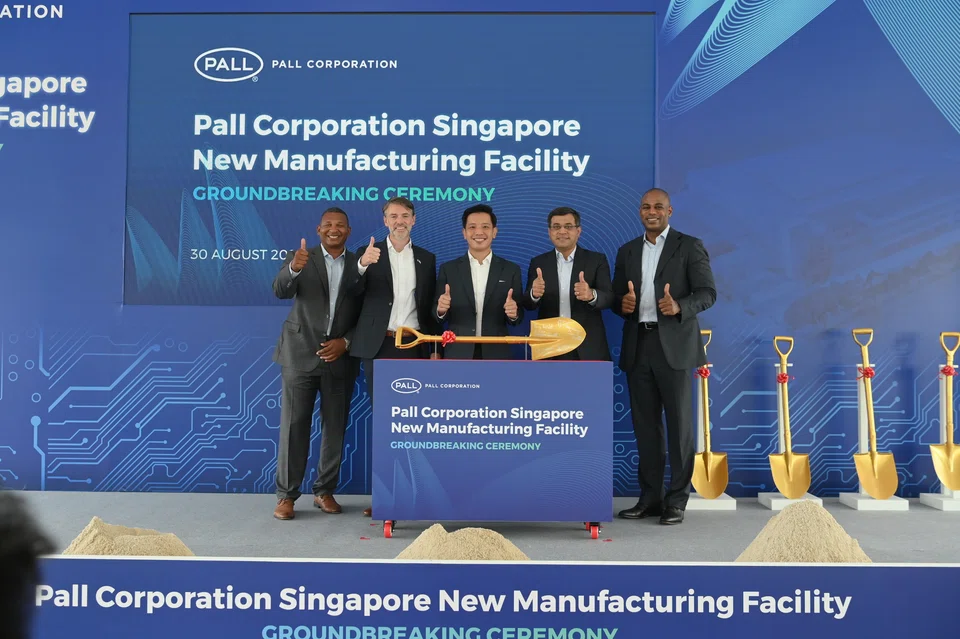 From left: Pall Corporation global operations vice-president Aaron Rivers, the Deputy Chief of Mission for the US Embassy Casey Mace, Minister of State for Trade and Industry Alvin Tan, Pall Corporation president Naresh Narasimhan and Pall Microelectronics vice-president Shangaza Dasent at the ground-breaking ceremony on Tuesday (Aug 30).  