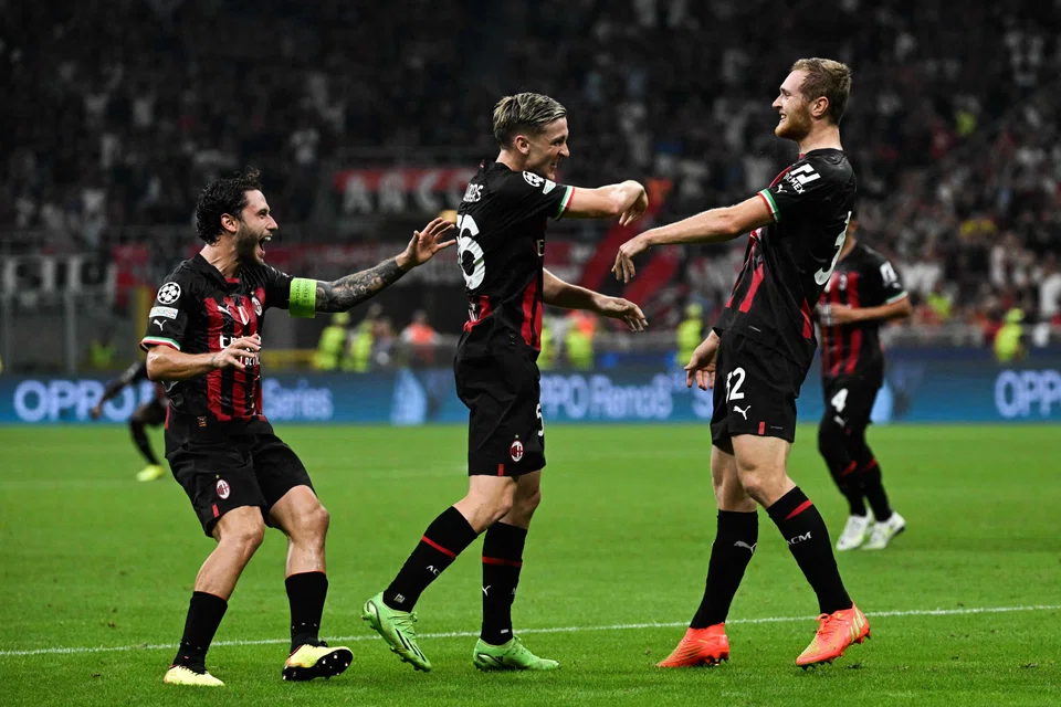 AC Milan midfielder Tommaso Pobega (right) celebrating after scoring in the 3-1 Champions League win over Dinamo Zagreb on Wednesday night. With him are defender Davide Calabria (left) and forward Alexis Saelemaekers.