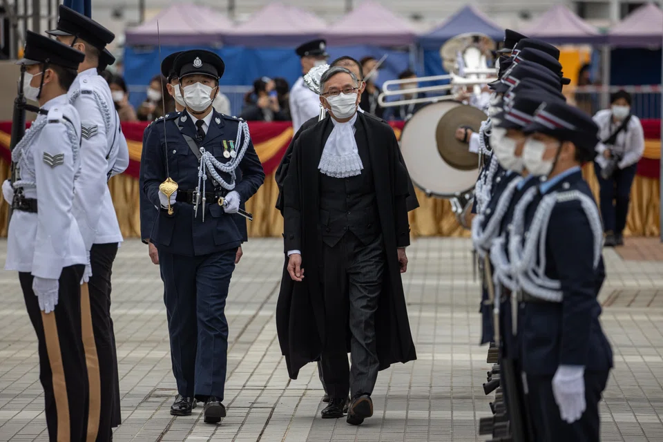 Chief Justice Andrew Cheung inspects a Ceremonial Guard mounted by the Hong Kong Police Force at the opening of the Legal Year in Hong Kong.