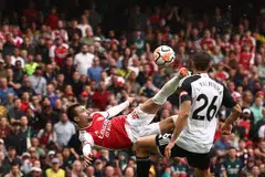Arsenal midfielder Fabio Vieira (in red) attempting a bicycle kick during the EPL match against Fulham on Aug 26. The match ended in a 2-2 draw.