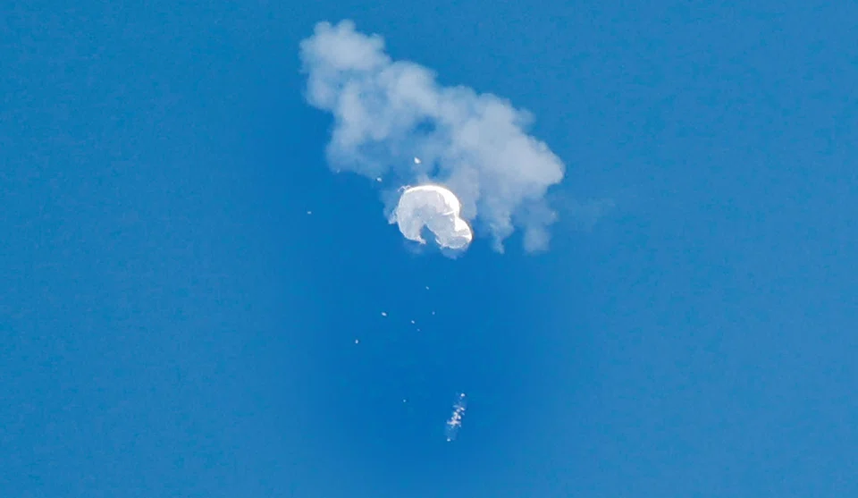 The suspected Chinese spy balloon drifting to the ocean after being shot down off the South Carolina coast in February.