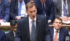 A video grab from footage broadcast by the UK Parliament, showing Britain's Chancellor of the Exchequer (finance minister) Jeremy Hunt making an autumn budget statement in the House of Commons in London on Thursday (Nov 17). 