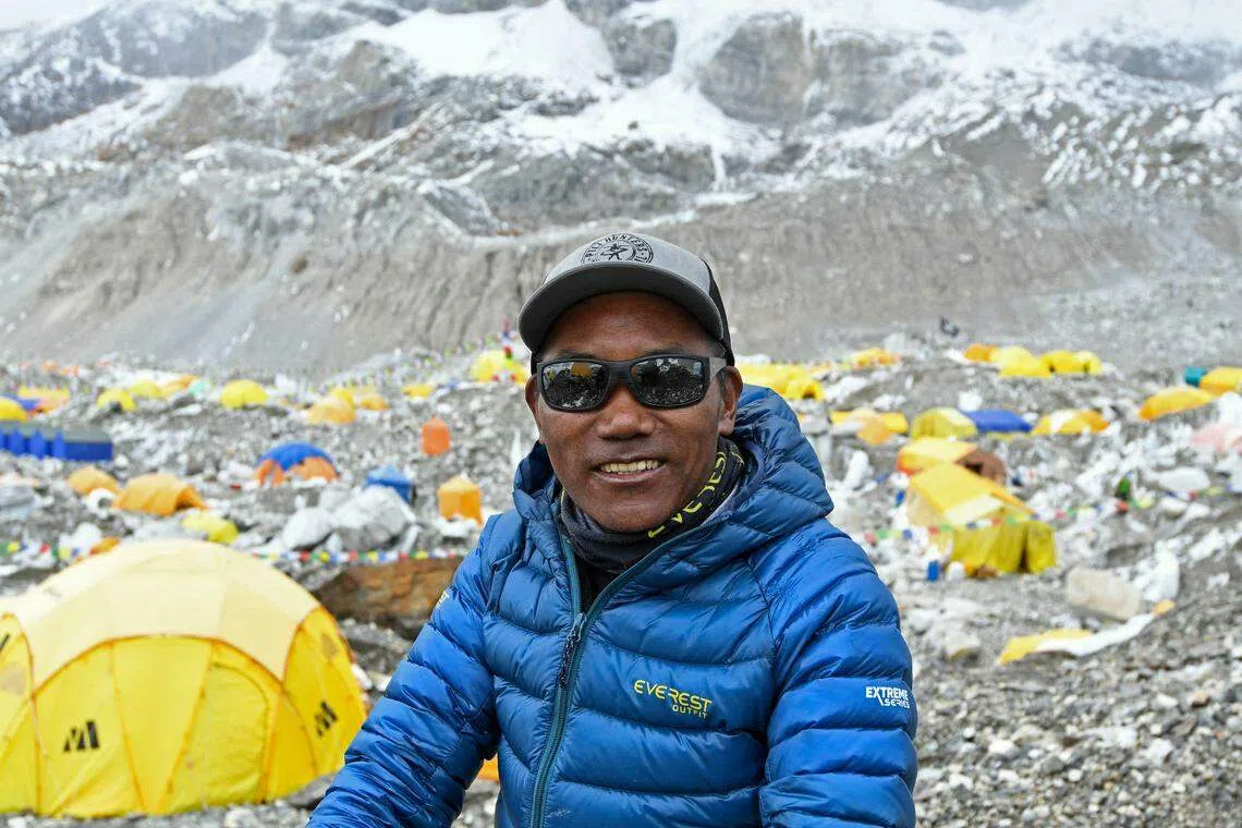 A guide for more than two decades and known as the “Everest Man”, Kami Rita Sherpa, 53, makes his 28th summit on May 23.