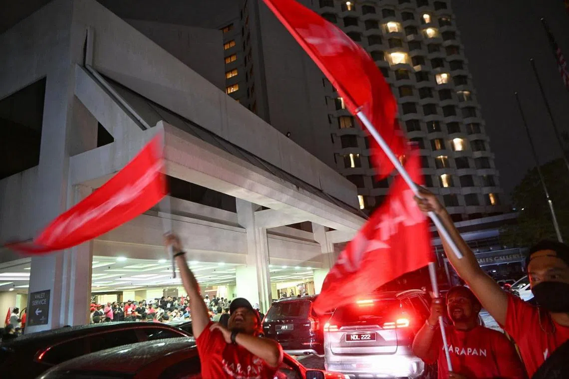 Pakatan Harapan supporters at Dorsett Grand Subang, where party leaders were gathering early on Nov 20, 2022.