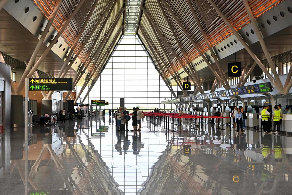 Tourists check in at the new Siem Reap-Angkor International Airport in Siem Reap, Cambodia, Nov 15, 2023. 