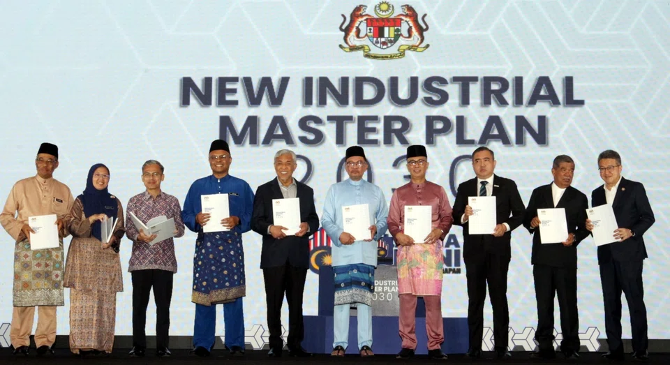 Malaysian Prime Minister Anwar Ibrahim (sixth from left) unveiled the New Industrial Master Plan with other ministers at the office of the Ministry of Investment, Trade and Industry in Kuala Lumpur on Friday (Sep 1).