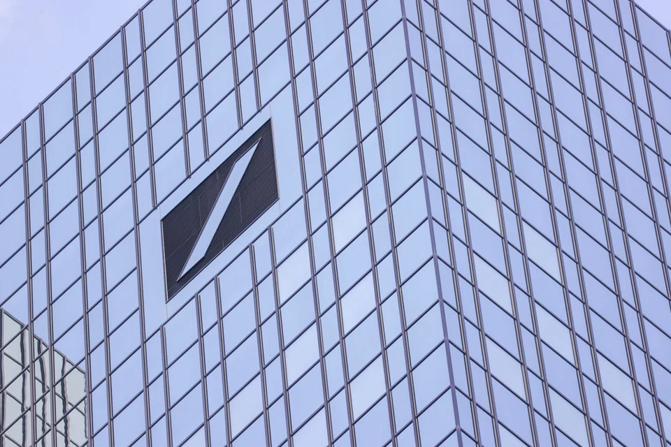 FILE PHOTO: Deutsche Bank's headquarters in the financial district of Frankfurt, Germany.  German financial watchdog BaFin is following up on indications that senior Deutsche Bank executives have been relying on messaging tools like WhatsApp and private e-mail accounts to conduct business, which can violate banking rules. 