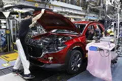 Japan's factory output surged a seasonally adjusted 8.9 per cent in June from a month earlier, posting the biggest one-month rise since comparable data became available in February 2013.