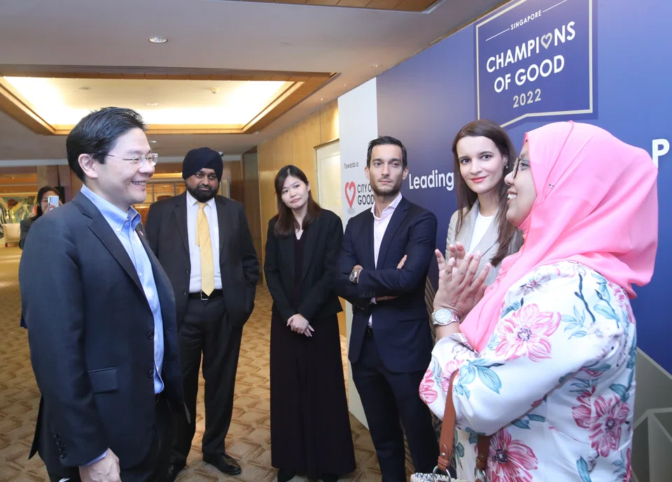 Deputy Prime Minister Lawrence Wong interacting with various Champions of Good 2022.