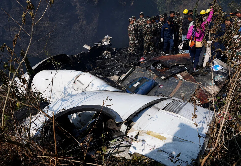 Hundreds of rescue workers were scouring the hillside where the Yeti Airlines flight, carrying 72 people from the capital Kathmandu, went down.