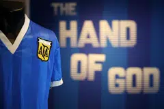 The jersey that Argentina football legend Diego Maradona wore when scoring twice against England in the 1986 World Cup, including the infamous “hand of God” goal, was auctioned for US$9.3 million, a record for any item of sports memorabilia, Sotheby’s said on Wednesday. 