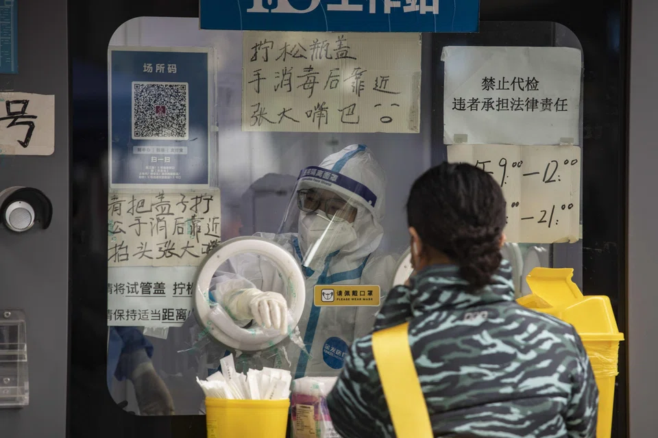 A Covid-19 testing booth in Shanghai, China. The country's watchdog is banning activities including price inflation, collusion, price discrimination, misleading propaganda and hoarding.