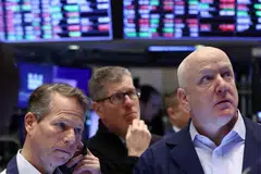 The Dow Jones Industrial Average fell 51.57 points, or 0.15 per cent, at the open to 33,874.44.