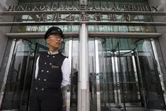 The Hong Kong Monetary Authority said it is premature to conclude whether the US rate hike cycle has been completed while the high interest rate environment is likely to last for some time.