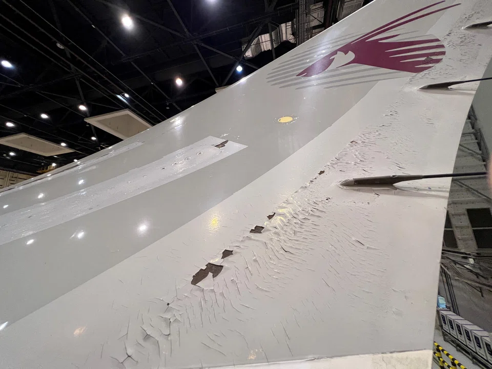 Surface damage seen on an Qatar Airways' Airbus A350 plane parked in Doha, Qatar, June 20, 2022. 