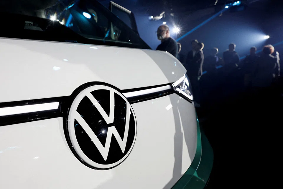 Automakers from VW to General Motors are exploring different business models as they race to electrify their lineups and catch Tesla.