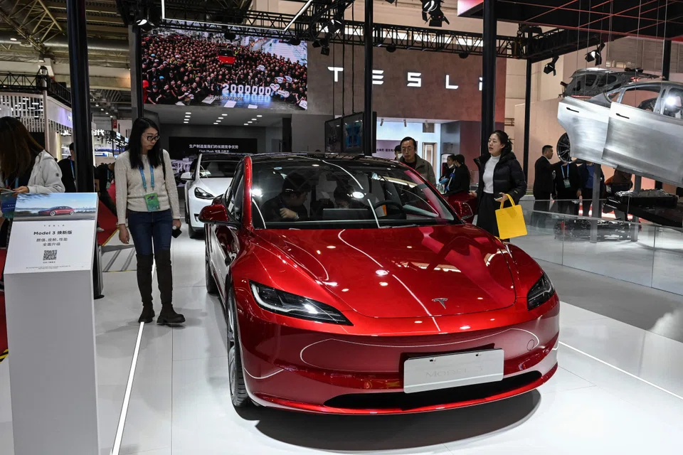 Deliveries of China-made Model 3 (pictured) and Model Y cars have risen 14.3 per cent from October.