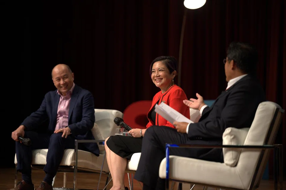 (From left) Singtel group CEO Yuen Kuan Moon, Microsoft Singapore managing director Lee Hui Li and SIM president and CEO Seah Chin Siong in discussion at a panel on the future of work.